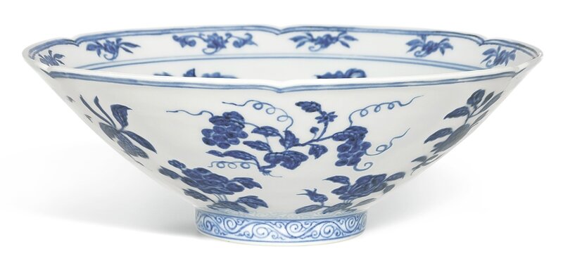 A fine and rare blue and white lobed ‘fruit and flower’ bowl, Mark and period of Xuande (1426-1435)