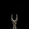 A bronze 'mythical beast' pole finial, shang dynasty