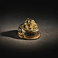 A gilt-bronze tiger-form weight, han dynasty (206 bc-ad 220)