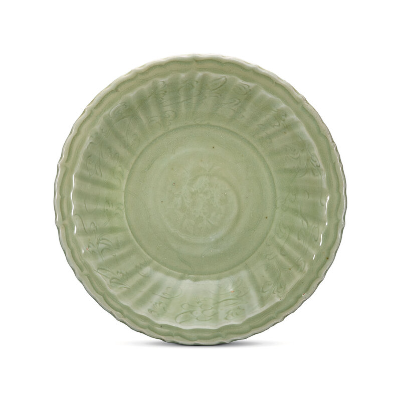 A large incised and moulded Longquan celadon ‘floral’ barbed-rim dish, Ming dynasty, 15th century
