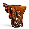 A rhinoceros horn 'Scholar' libation cup, Ming dynasty, 16th-17th century