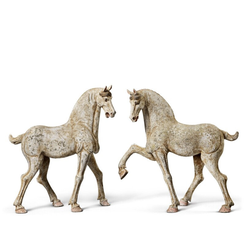 A pair of painted pottery figures of horses, Tang dynasty