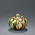 A small sancai-glazed globular jar and cover, Tang dynasty (618-907)